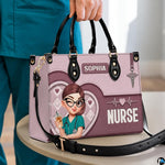 Chibi nurse pink quilted heart handbag held above round table in clinical room setting.