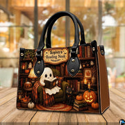 Indoor still life perspective of autumn library satchel resting on a wooden tabletop.
