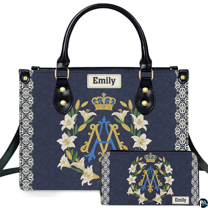 Marian crowned monogram lily handbag and matching wallet displayed together on clean white backdrop.