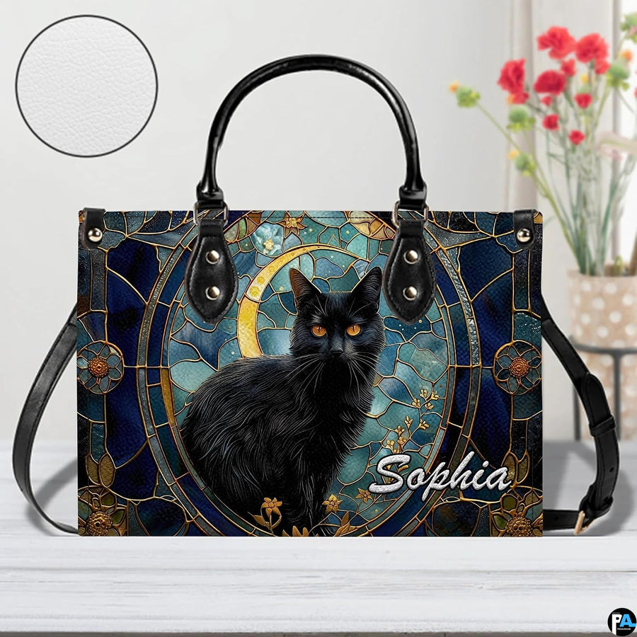 Studio presentation of celestial stained glass black cat and crescent moon artwork.