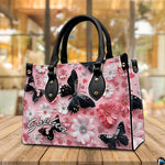 Three-quarter perspective angle view of butterfly handbag set