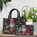 Handbag and matching wallet set with vintage Santa artwork displayed on wooden table with plants.