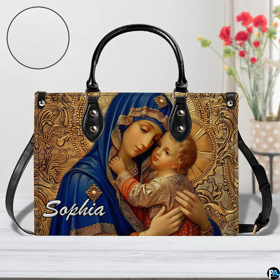Madonna and Child handbag displayed with circular surface texture zoom detail inset