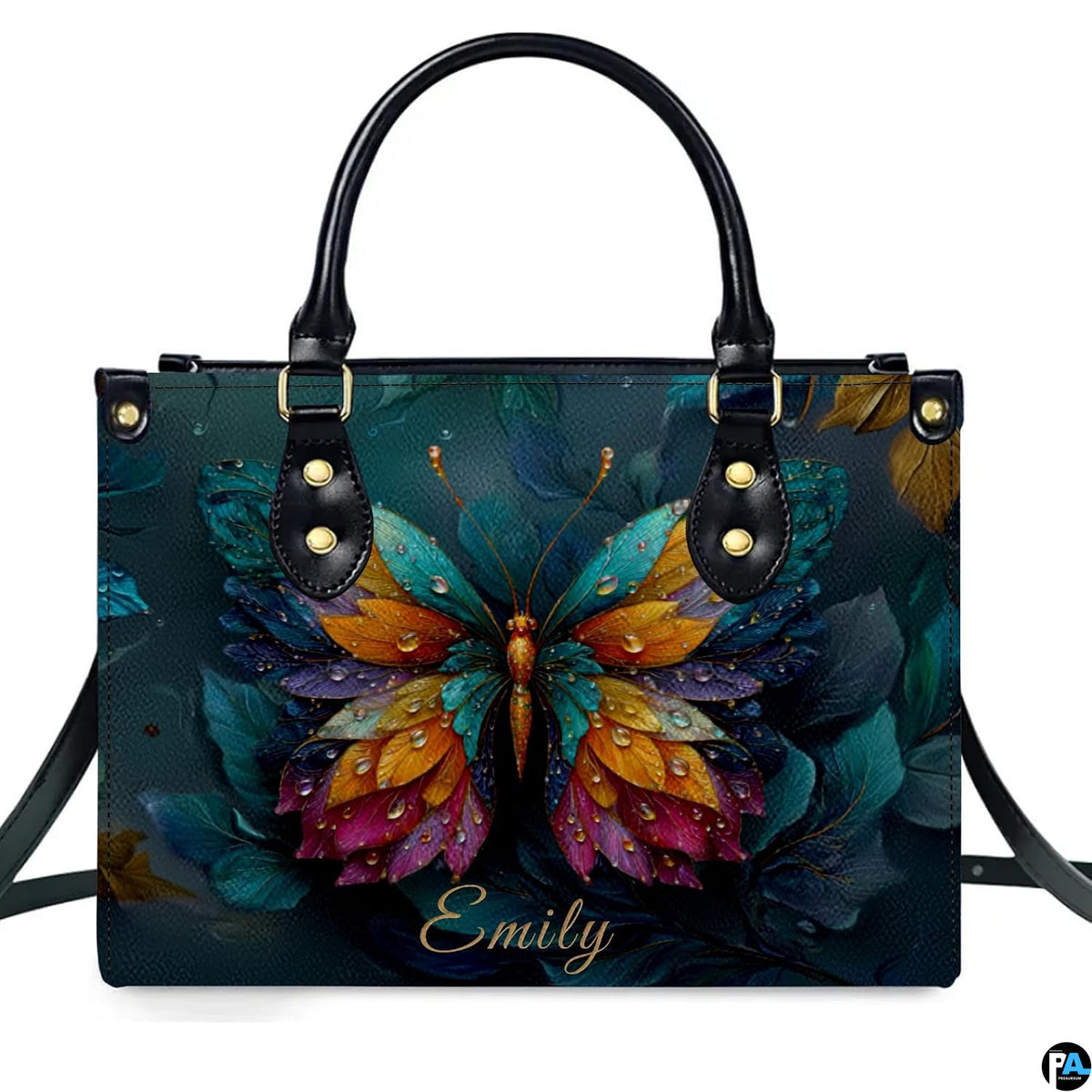 Model carrying butterfly handbag and matching wallet demonstrating scale