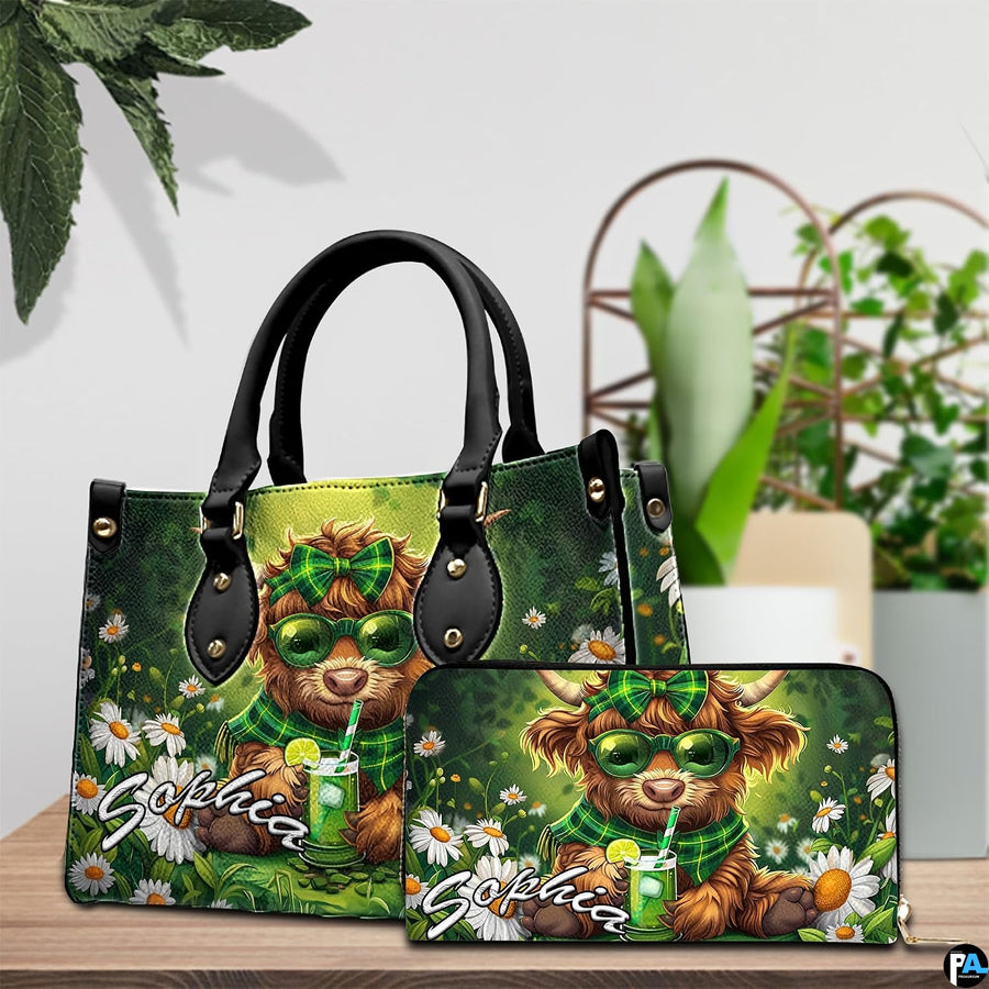 Tabletop presentation displaying the green plaid calf and daisy artwork alongside potted plants.
