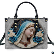 Front view of Virgin Mary cerulean veil cameo bas-relief handbag on white background