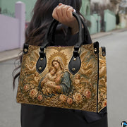 Matching Madonna and angels handbag and wallet set in botanical lifestyle display