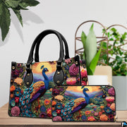 Peacock landscape handbag and matching wallet displayed on a table