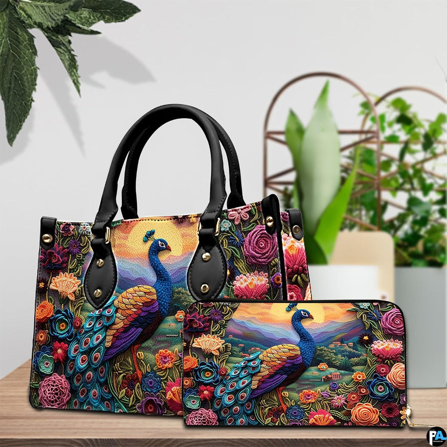 Peacock landscape handbag and matching wallet displayed on a table