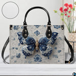 Top down view of porcelain butterfly handbag displaying spacious interior opening