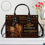 Front view of African portrait handbag with geometric bronze border