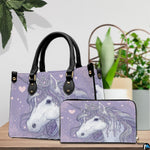 Top down view of unicorn handbag showing zipper closure and interior opening.
