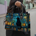Model walking outdoors holding the nocturnal cat on crescent moon stained glass printed creation.