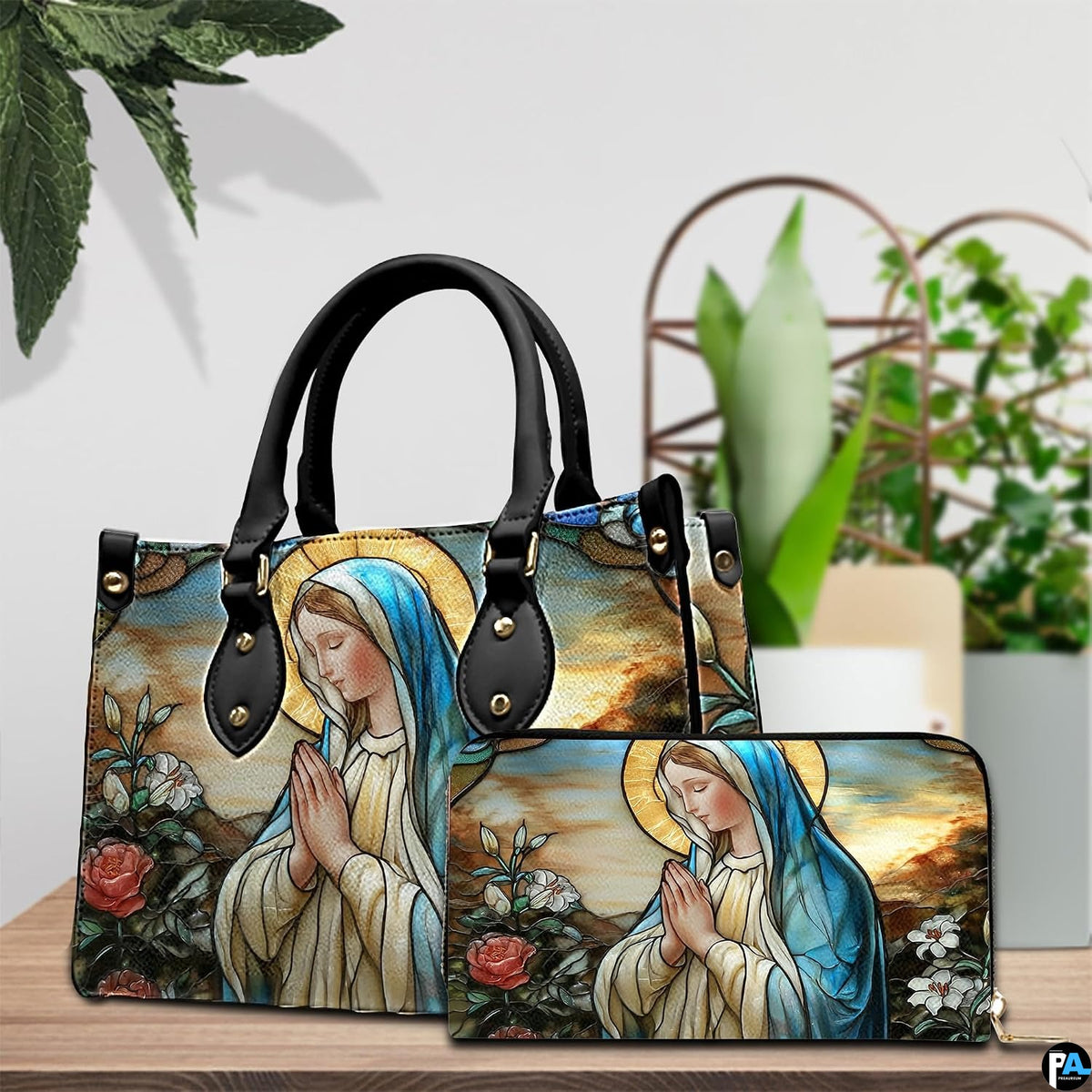 Matching handbag and zippered wallet set displayed together with stained glass art.