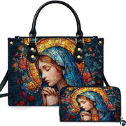 Front view of turquoise veil madonna handbag with companion continental wallet on white studio background.