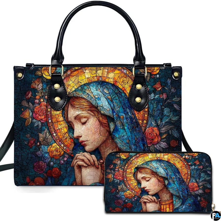Front view of turquoise veil madonna handbag with companion continental wallet on white studio background.