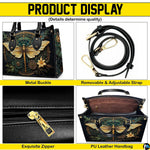 Top view of gold dragonfly handbag showing zippered top closure and dual structured handles