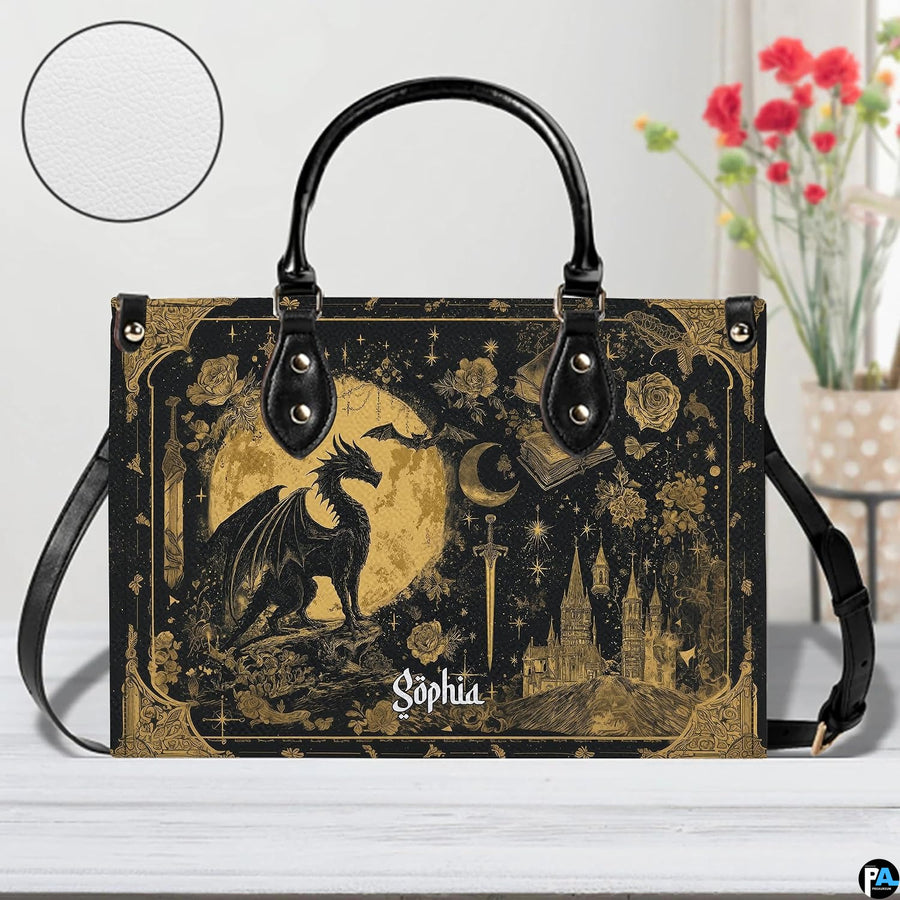Golden dragon moon handbag displayed upright on white background.