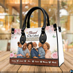 Arrangement of floral handbag and wallet presenting the unified botanical portrait theme.