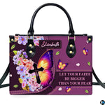 Front product view of the purple butterfly cross Christian handbag on white background
