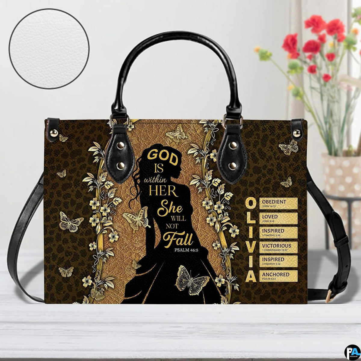 Front view of female silhouette handbag with inset circle highlighting textured exterior detail.