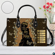 Front view of female silhouette handbag with inset circle highlighting textured exterior detail.