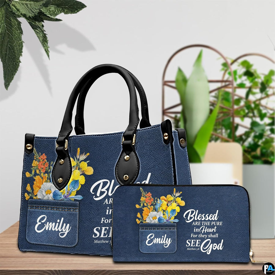 Angled display showing scripture denim handbag beside matching personal organizer