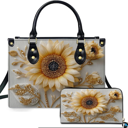 Front view of radiant sunflower bloom handbag and matching wallet set with gilded foliage accents.