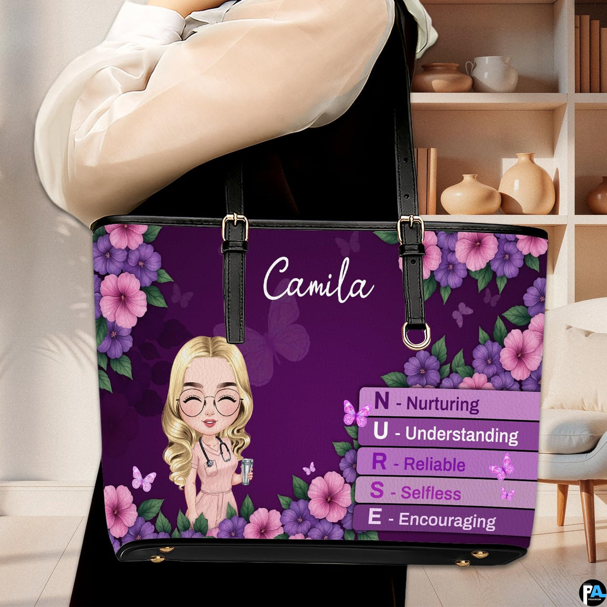 Lifestyle model carrying the Purple Floral Clinician Handbag over shoulder in an indoor room setting.