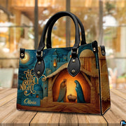 Detailed view of matching Bethlehem nativity scene zippered wallet