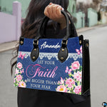 Model outdoors carrying denim and lace floral peony handbag