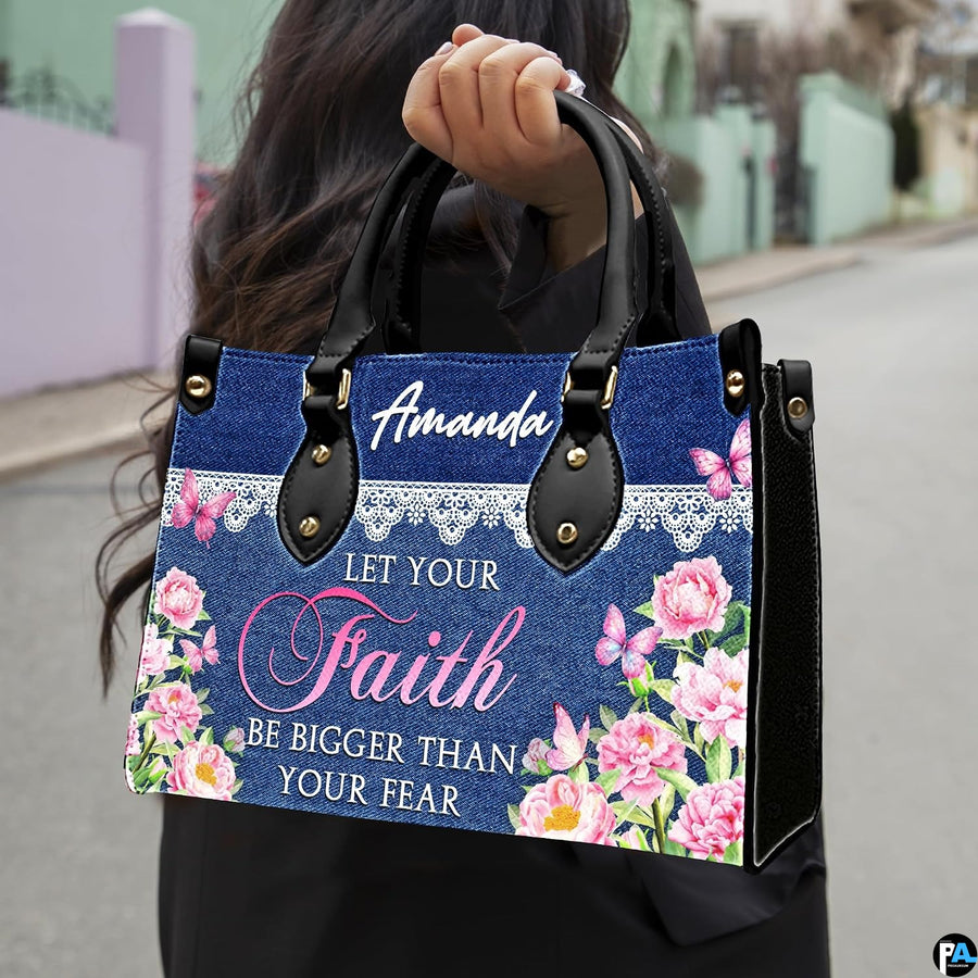 Model outdoors carrying denim and lace floral peony handbag