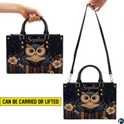 Top-down view of the handbag highlighting clean lines and dual carrying handles.