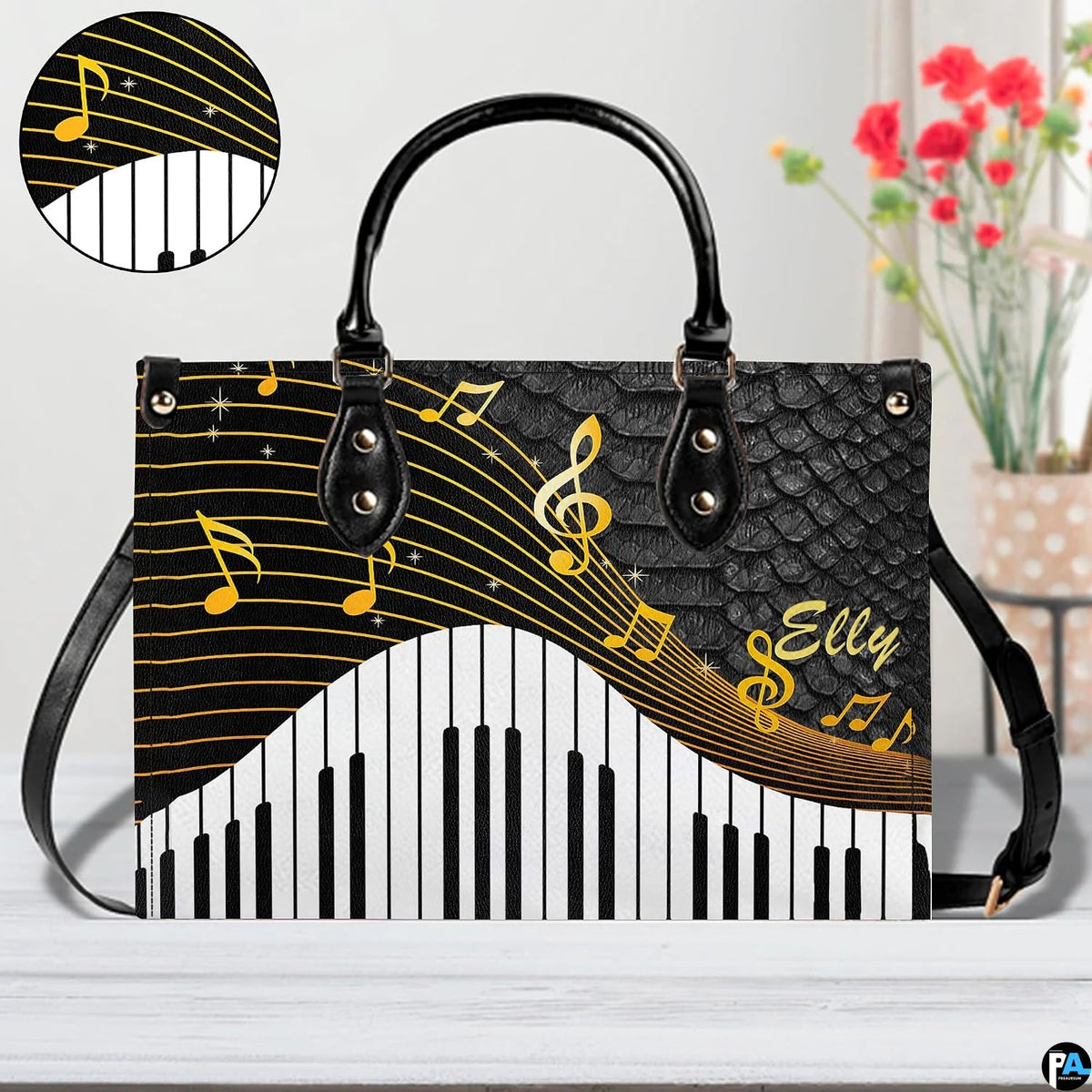 Tabletop presentation of wave piano artwork positioned beside floral vase and circular detail inset.