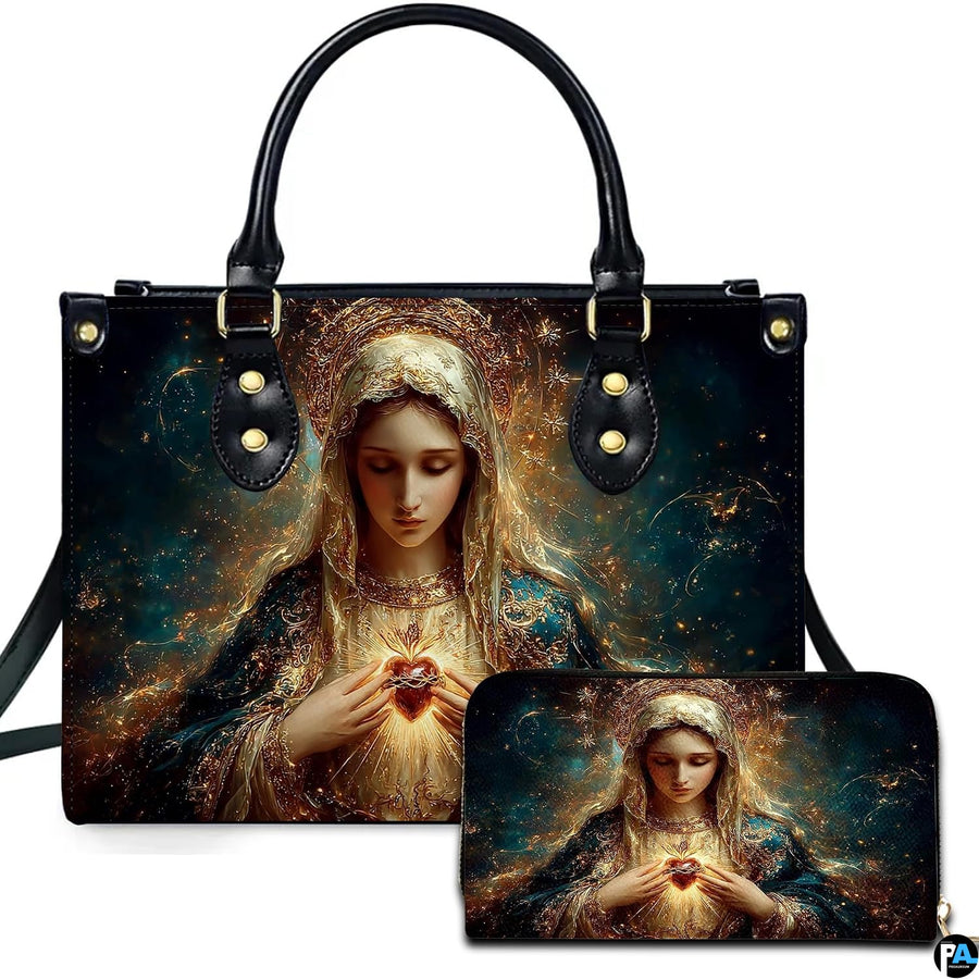 Handbag and matching wallet with glowing Immaculate Heart of Mary sacred art on celestial navy background.