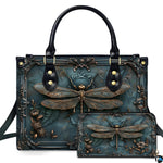 Embossed bronze dragonfly and baroque frame handbag and wallet set displayed together on white background