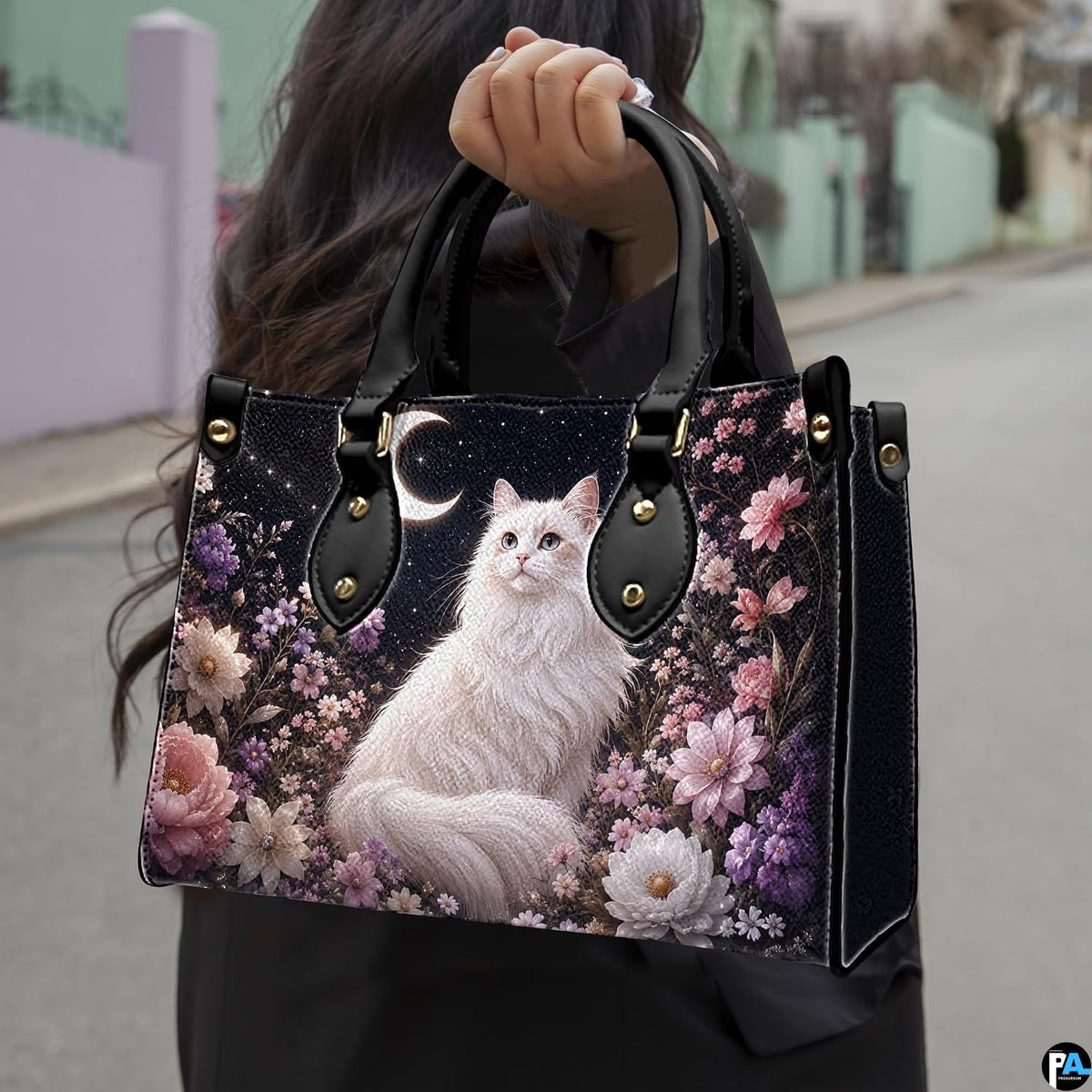 Outdoor view showcasing celestial white cat artwork held alongside an urban walkway.