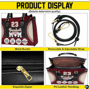Side profile view of structured baseball handbag showing sleek silhouette and black carrying handles.