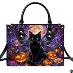 Direct front studio view showcasing the winged black cat, full harvest moon, and glowing pumpkins on white surface.