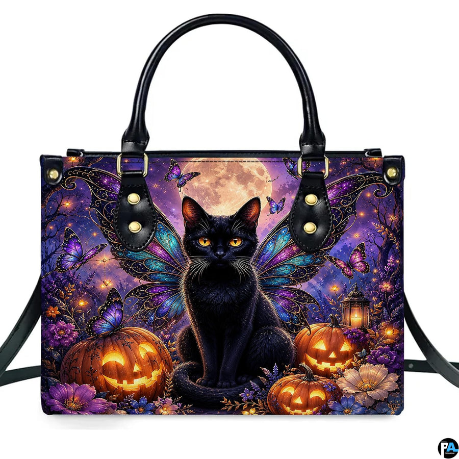 Direct front studio view showcasing the winged black cat, full harvest moon, and glowing pumpkins on white surface.
