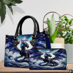 Cosmic shadow dragon handbag and wallet set shown together on wooden tabletop next to green plant.
