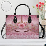 Interior compartment view of unicorn handbag showing inner lining and organization.