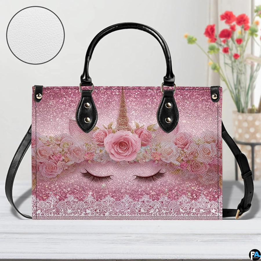 Interior compartment view of unicorn handbag showing inner lining and organization.
