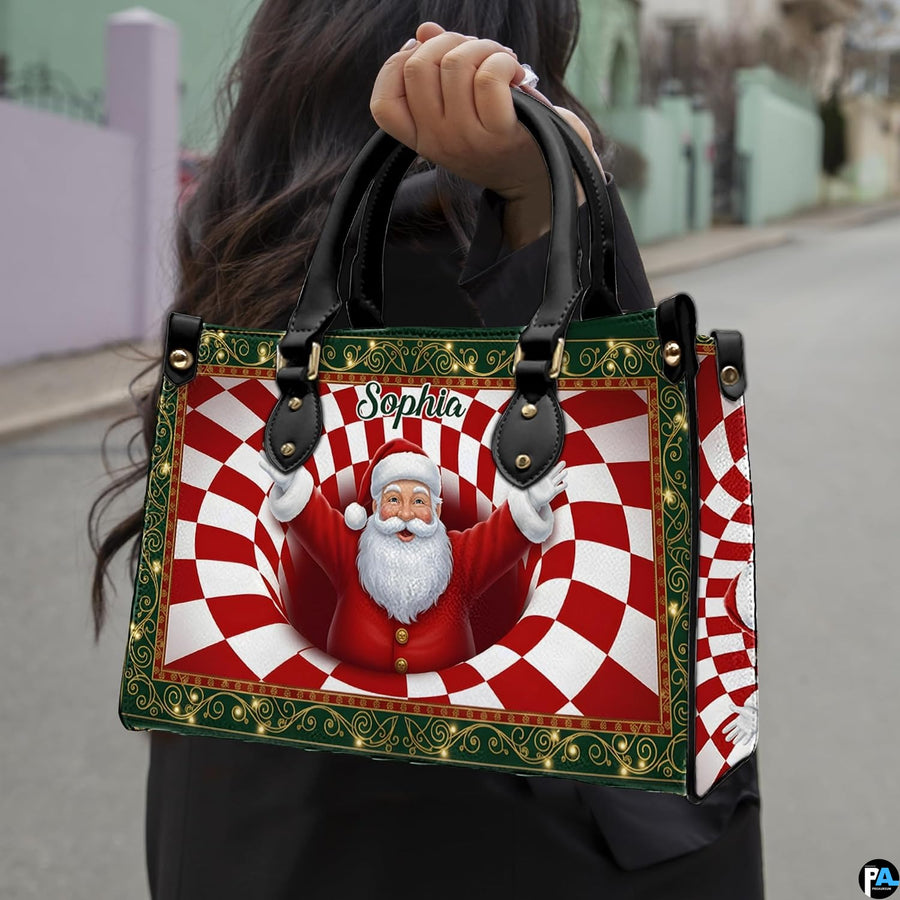 Woman holding holiday handbag outdoors showing Santa Claus optical illusion artwork in daylight.