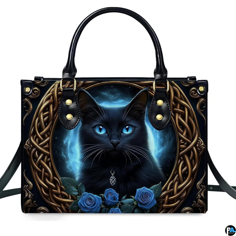 Frontal studio presentation showcasing the piercing blue-eyed cat, Celtic knot medallion, and blue roses.