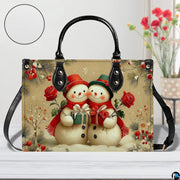 Macro close-up highlighting fine artistic details in the snowmen's rosy cheeks, top hats, and red roses.