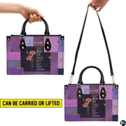 Detailed perspective of purple patchwork pattern on handbag and wallet accessories.