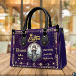 Tabletop perspective of Celestial Scales Satchel Handbag resting on indoor wooden surface.