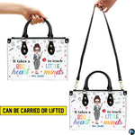Handbag interior compartment arranged for daily personal and teaching essentials.