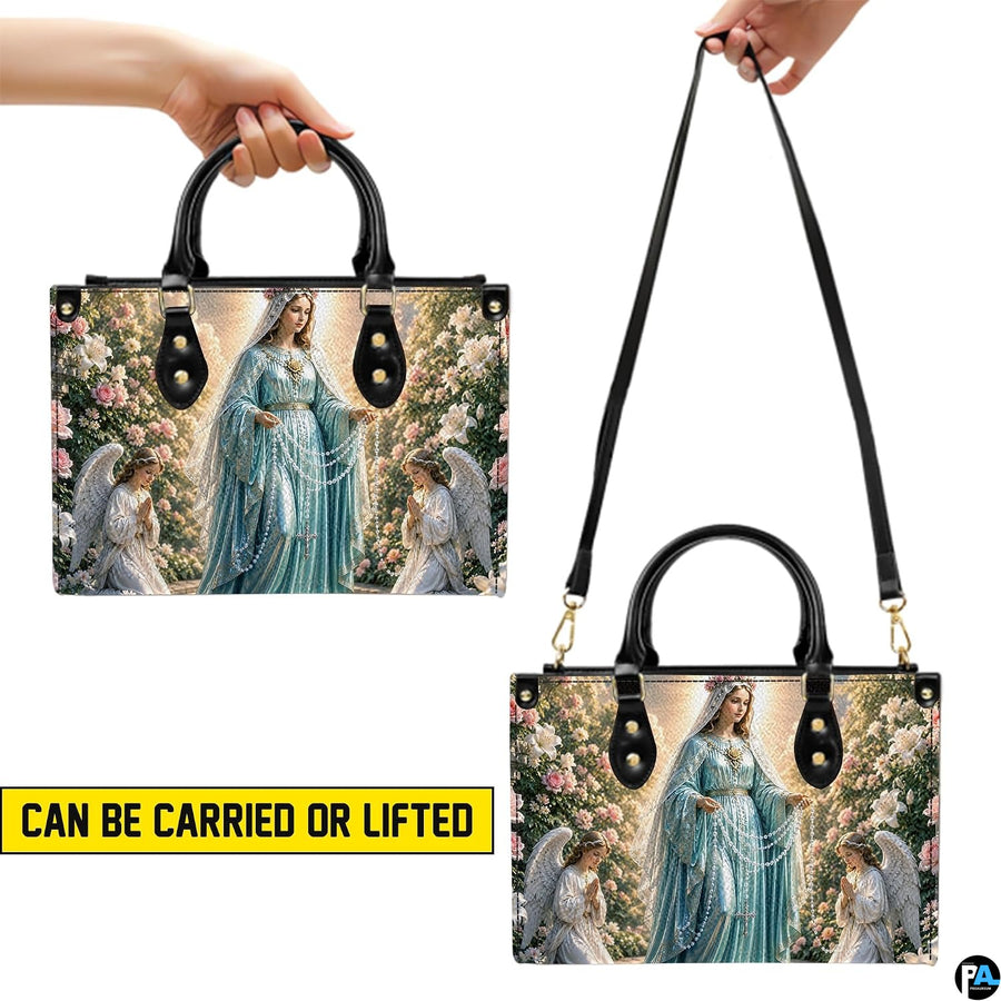 Side profile view of structured rosary handbag showing silhouette and black carry handles